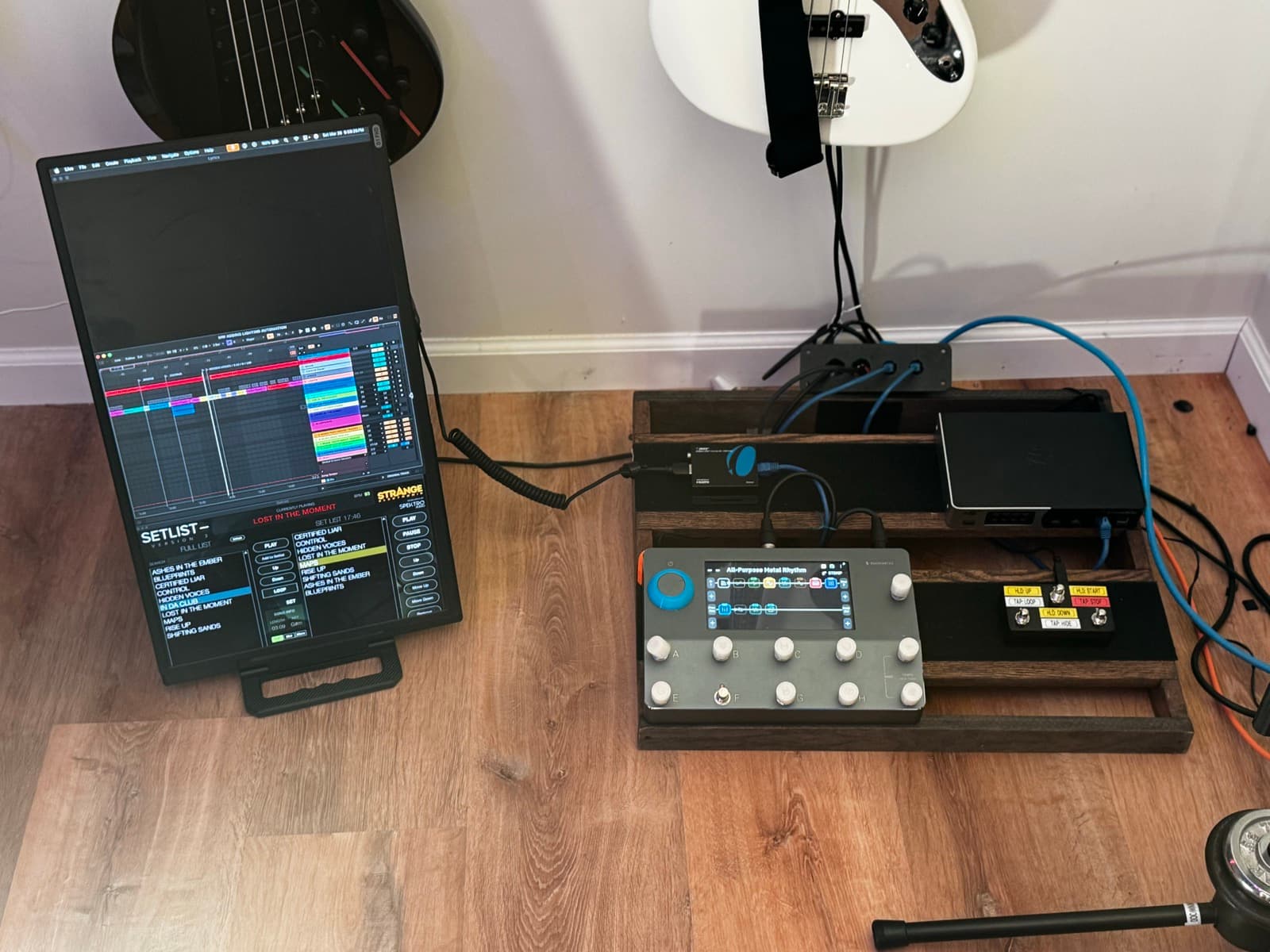 Matt's networked guitar and playback control board beside a tablet running a setlist