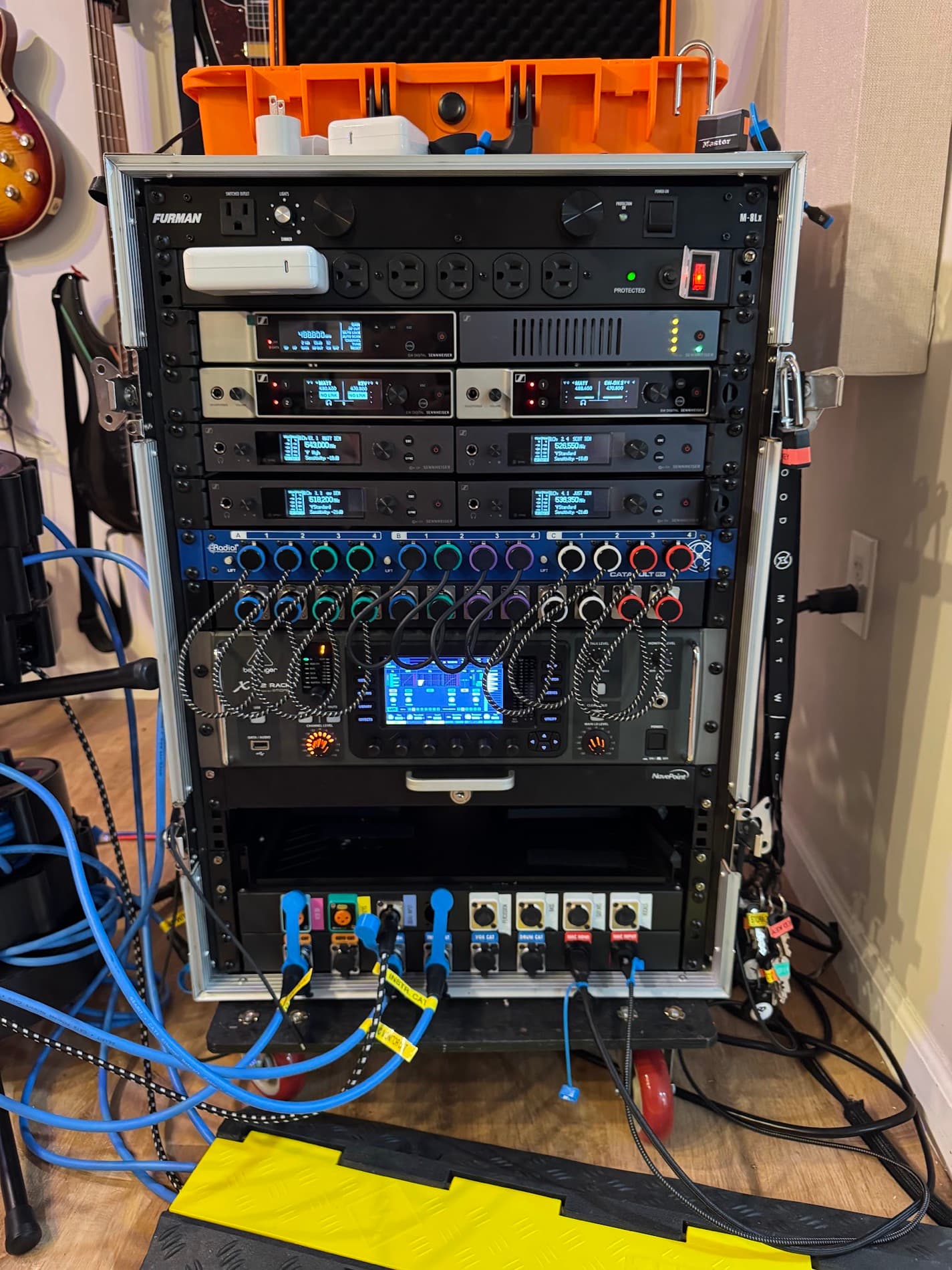 Matt's current 16U IEM and playback rack with wireless receivers, color-coded patching, digital mixing, and power distribution