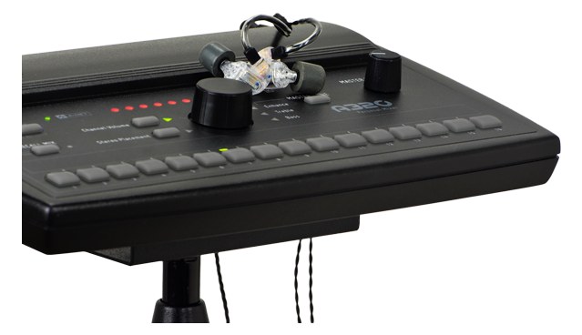 Aviom A320 Personal Mixer — personal mixer on a mic-stand mount with earphones