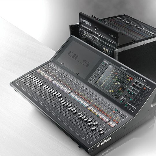 Yamaha QL5 — three-quarter view with a rack-mounted QL1 behind it